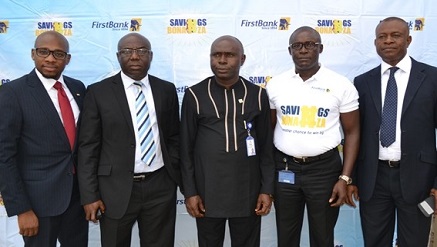 L-R: Mr. Lawrence Amadi, Senior Manager, KPMG Advisory Services; Mr. Anthony Uwandu, Business Development Manager Enugu 1, FirstBank; Zonal Coordinator, Mr. Eke Micheal, National Lottery Regulatory Commission; Mr. John Okah, Business Development Manager, Awka, FirstBank,; and Mr. Maxwell Ezenwa, Team Lead (Liability Generation) Consumer Banking, FirstBank, at the FirstBank Savings Bonanza Draw held in Awka recently.